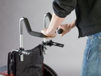 Skubbehåndtagsforhøjer kørestol