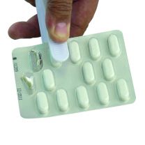 Pillöppnare med förvaring